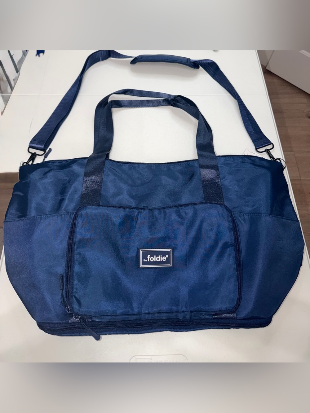 The Foldie 40L Expandable Travel Bag Navy Blue Foldable Weekender Duffel NWT